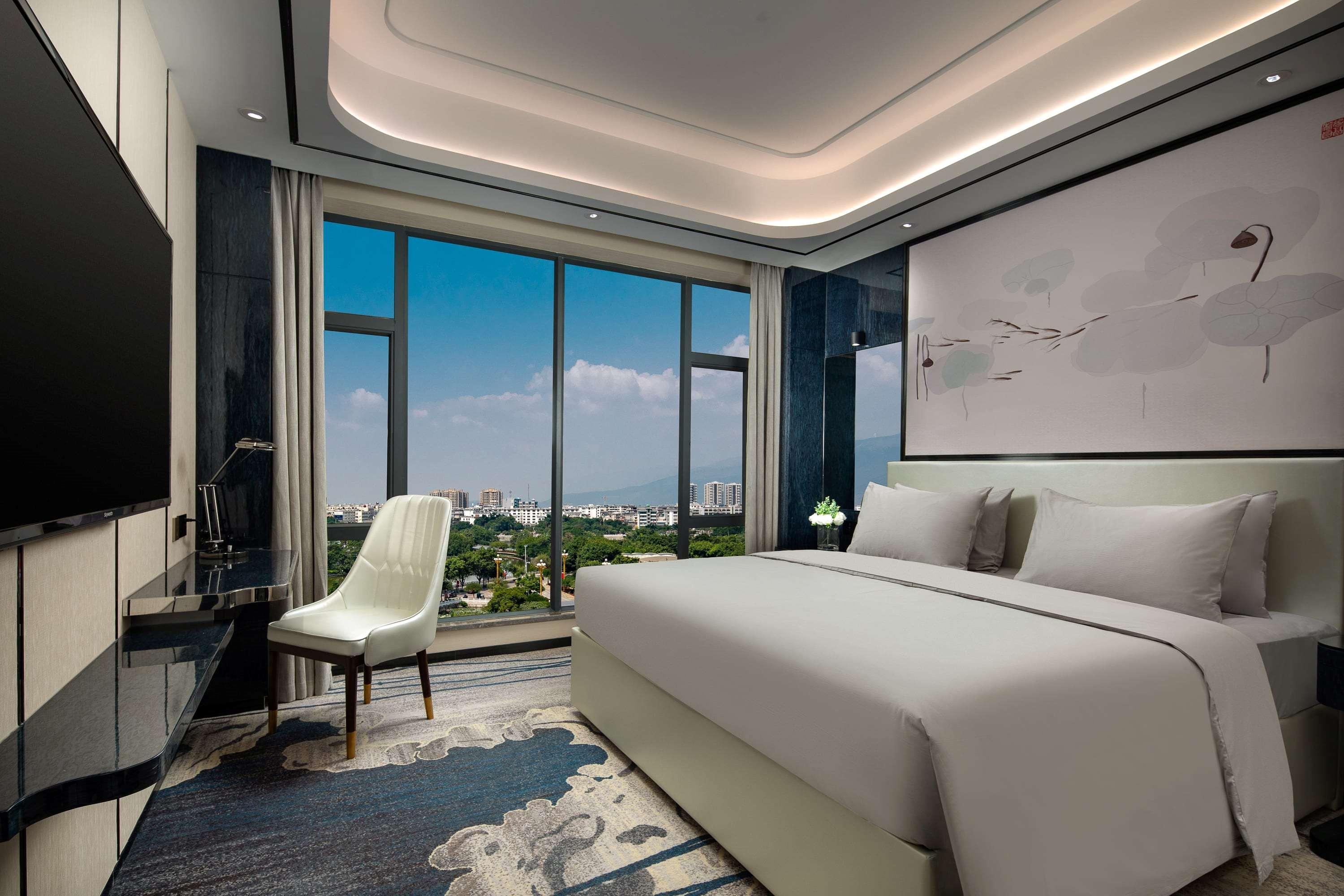 Ramada By Wyndham Mengzi Suites エクステリア 写真