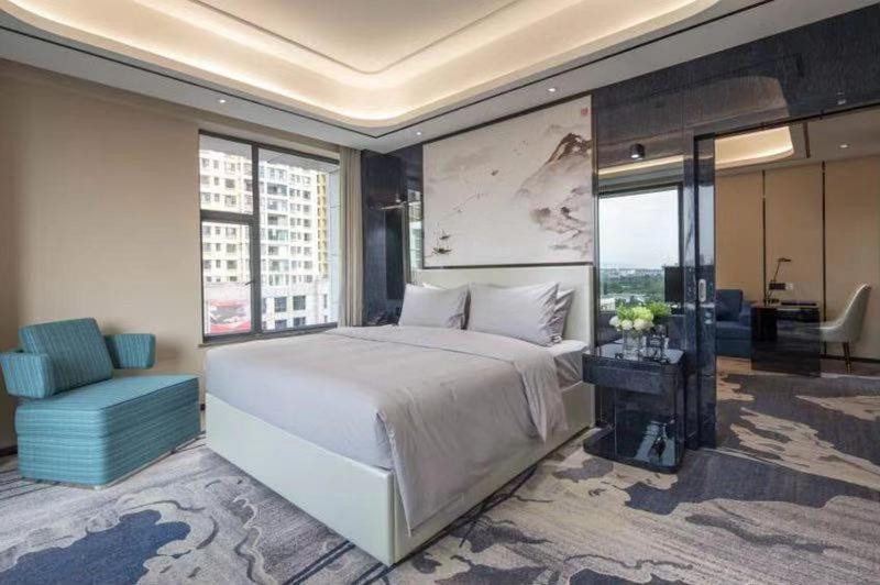 Ramada By Wyndham Mengzi Suites エクステリア 写真